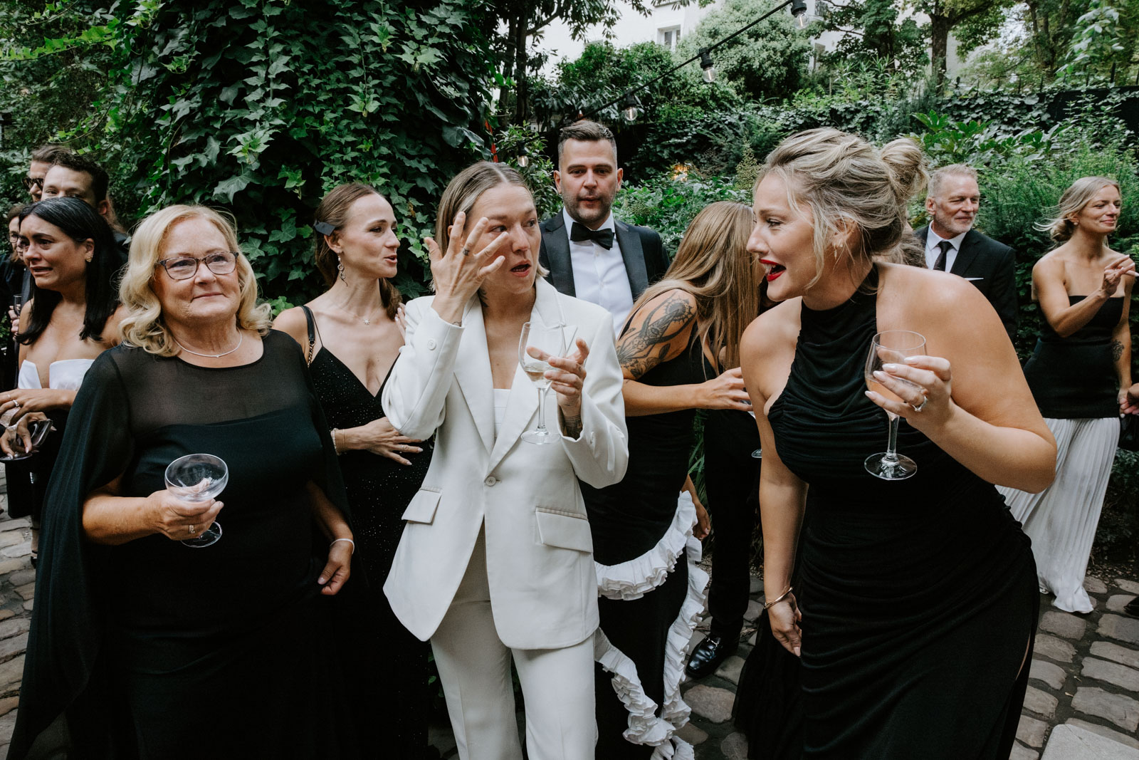 The family gets emotional during this gay wedding in the garden of Hotel Particulier Montmartre, Paris