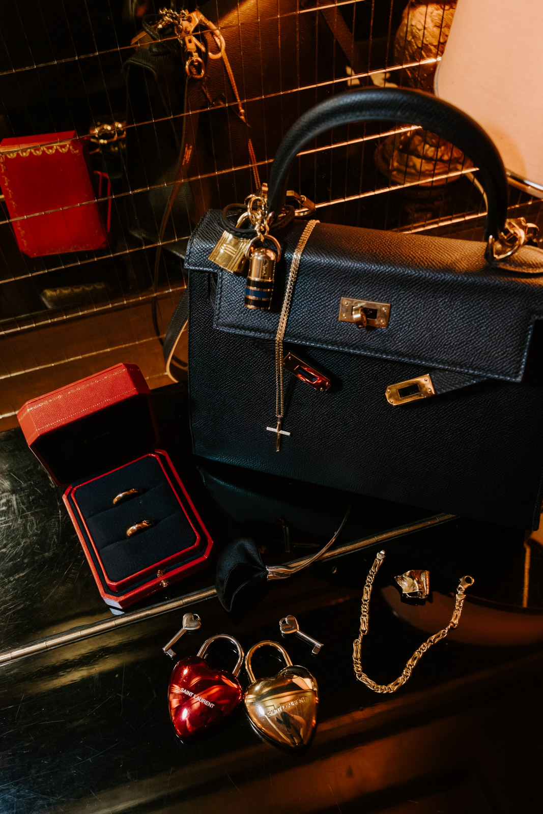 Hermes, Cartier and Saint Laurent bag and jewellery details for this gay wedding at hotel particulier montmartre