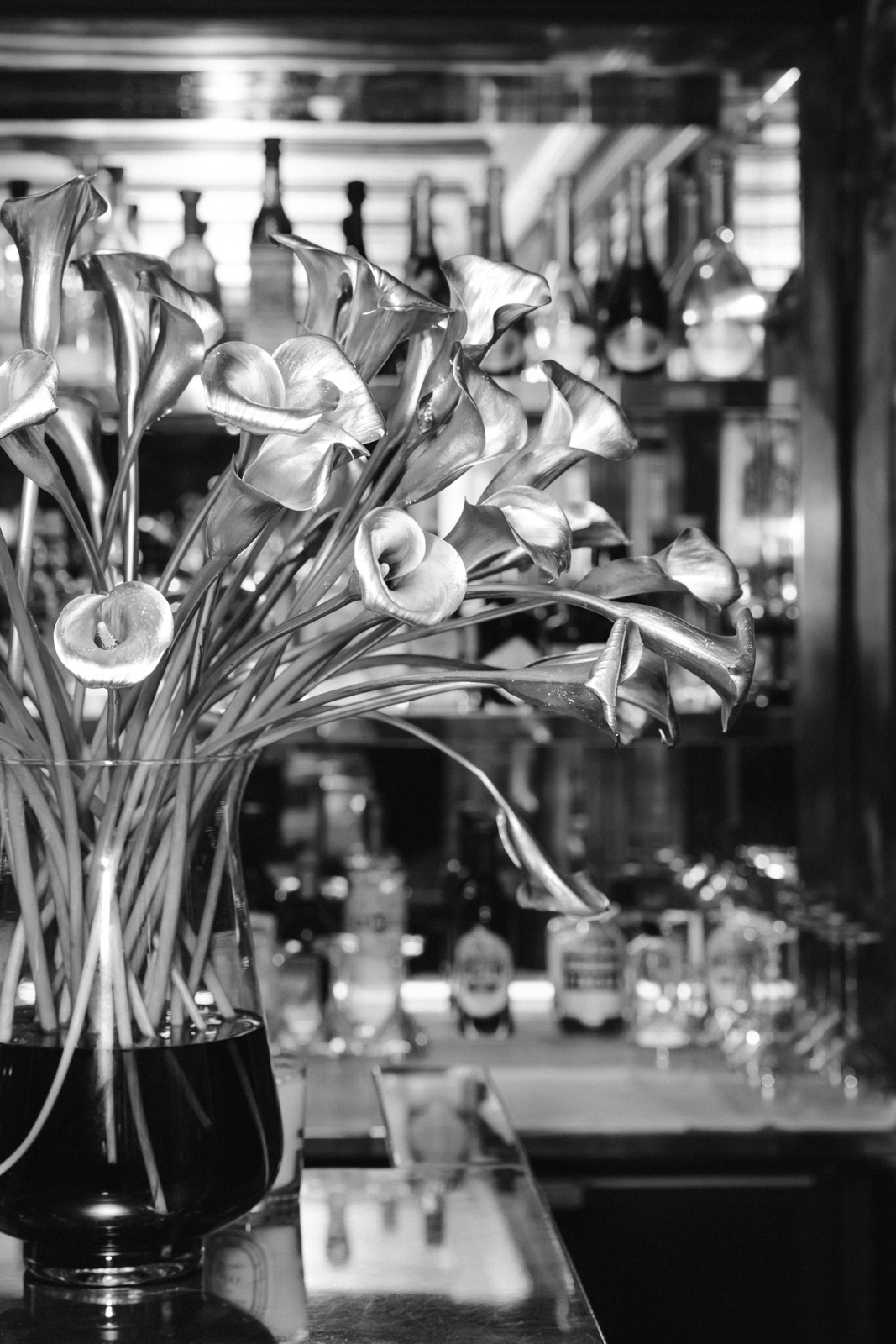 a Maplethorpe inspired bouquet of silver painted lilies for this wedding at hotel particulier montmartre